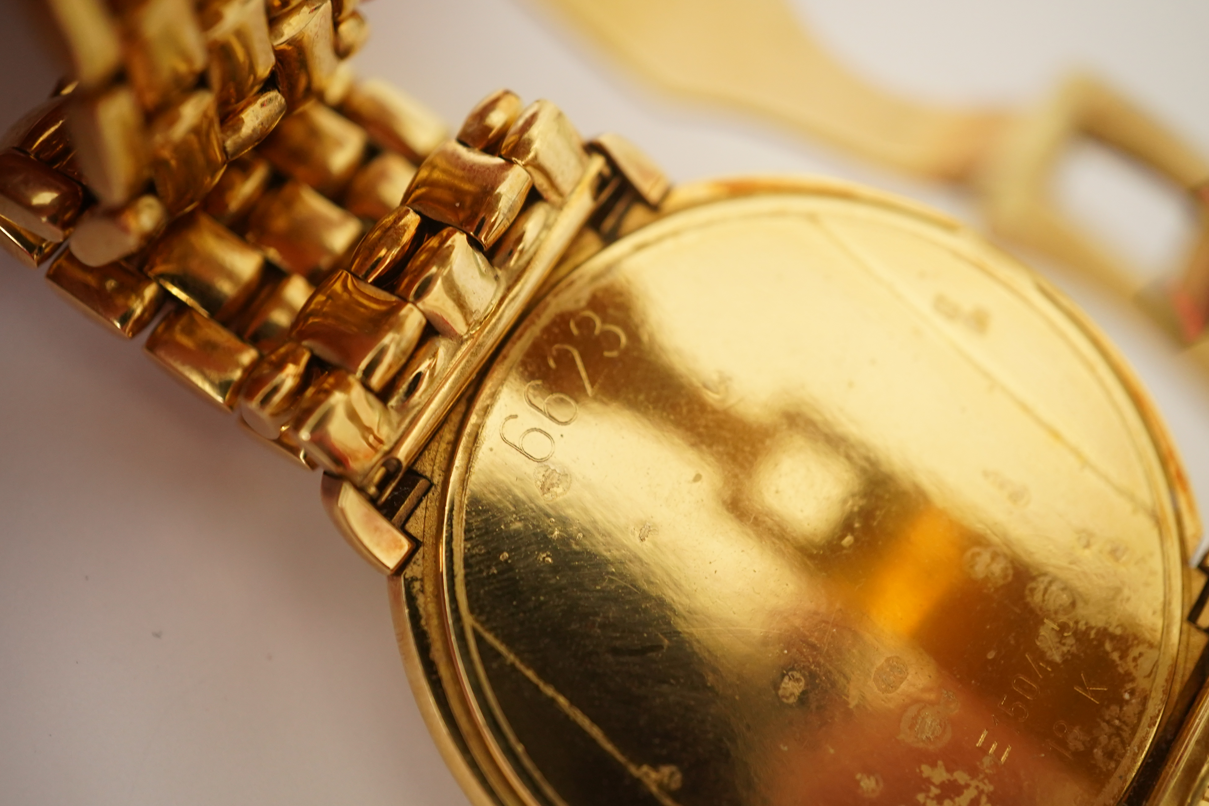 A gentleman's 1990's 18ct gold Rolex Cellini quartz dress wrist watch, on an 18ct gold Rolex brick link bracelet, with deployment clasp